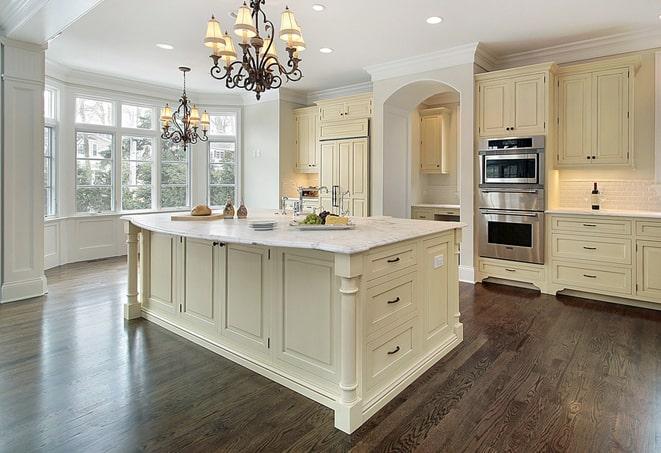 bright and airy dining room with laminate floors in Deerfield Beach, FL