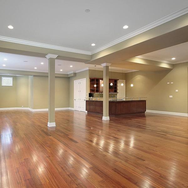 hardwood floors can be installed over existing tile or carpet with the proper preparation